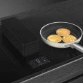 Płyta indukcyjna ze zintegrowanym okapem Smeg HHSL7845MB